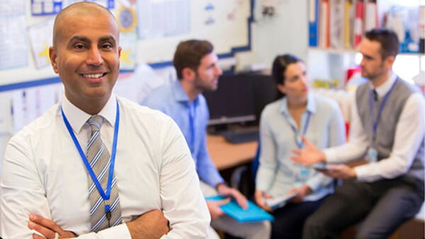 Engaged teacher in a classroom setting